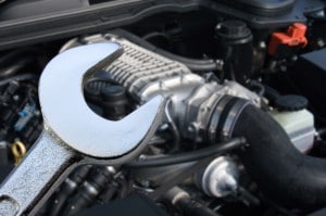 V8 Supercharged car engine and spanner